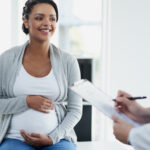 doctor-consulting-with-pregnant-patient